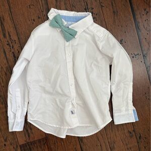 Little English button down white with clip on bow tie.